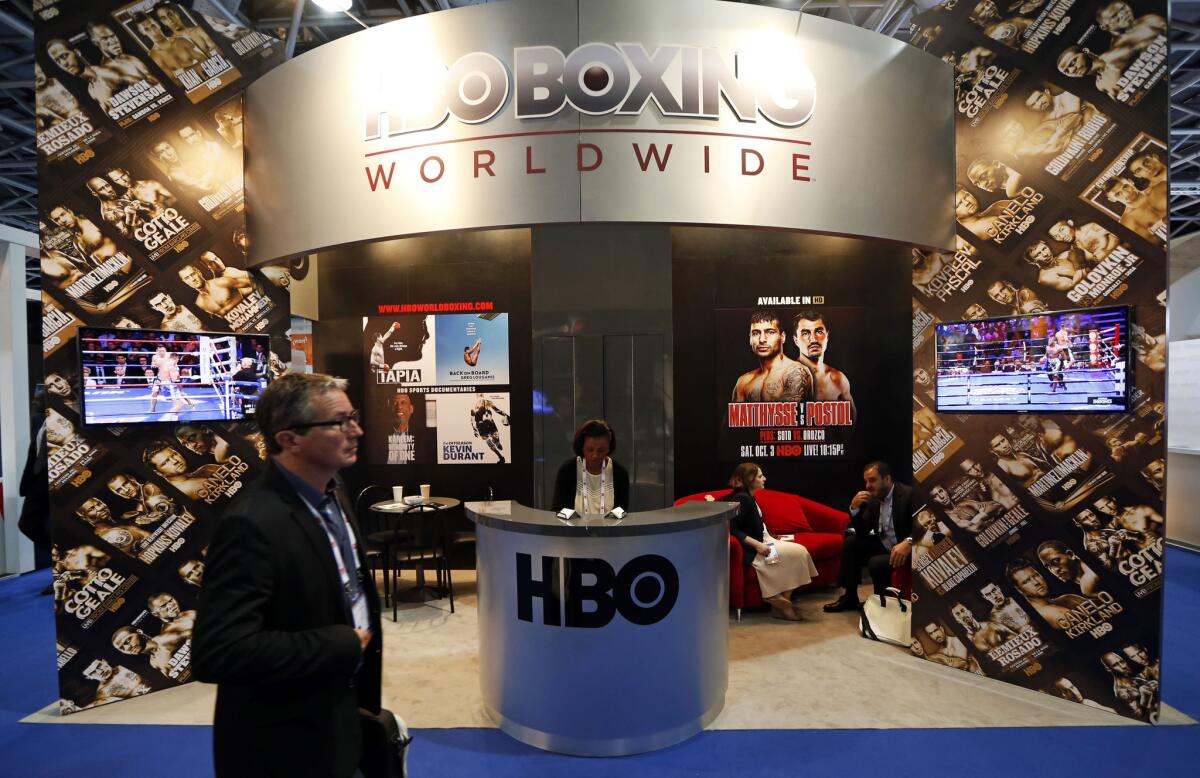 A man walks past the HBO Boxing Worldwide booth at The World Sports Content Media Convention on Oct. 12 in Monaco.