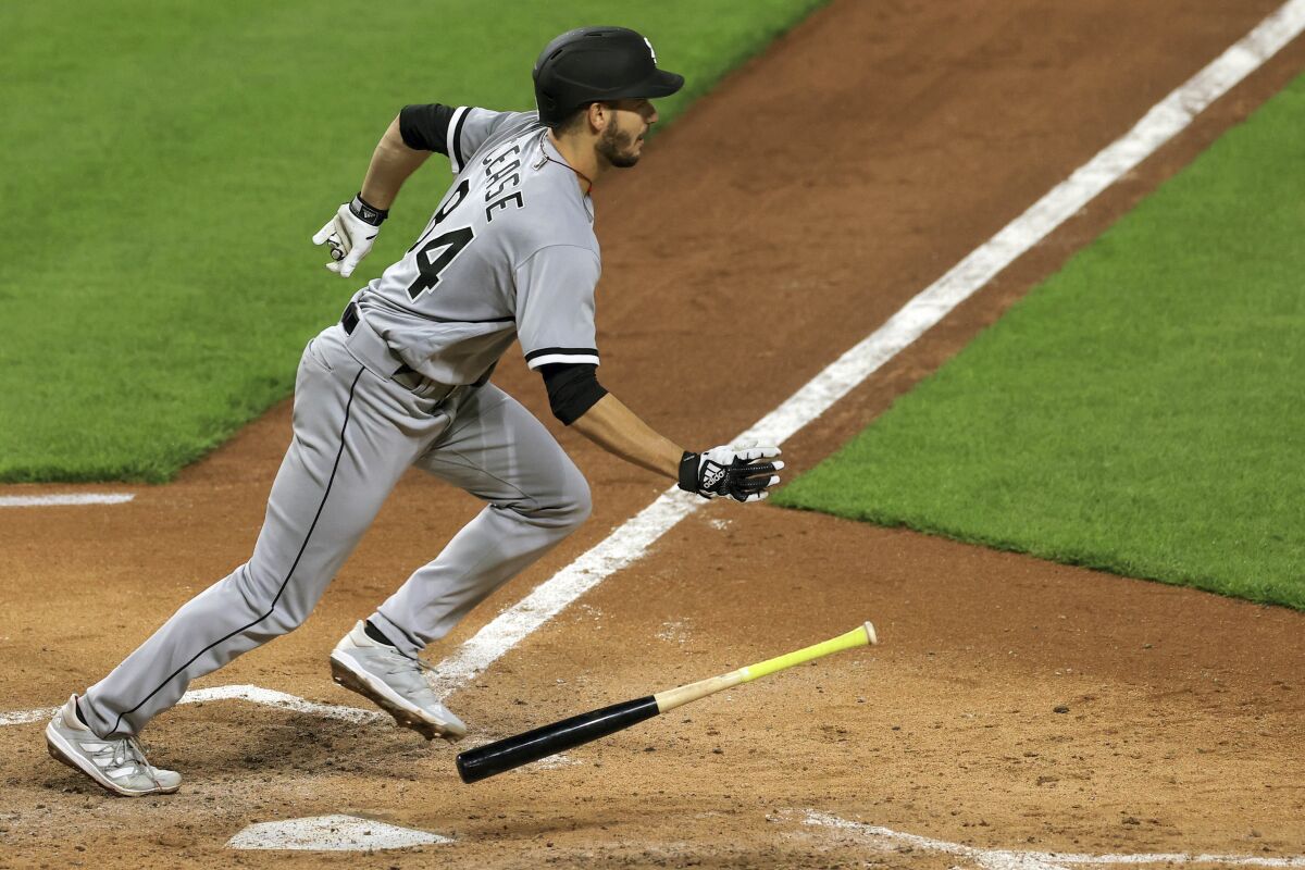Chicago White Sox Dylan Cease hits for a single during the fifth inning of a baseball game against the Cincinnati Reds, Tuesday, May 4, 2021 in Cincinnati. (AP Photo/Aaron Doster)
