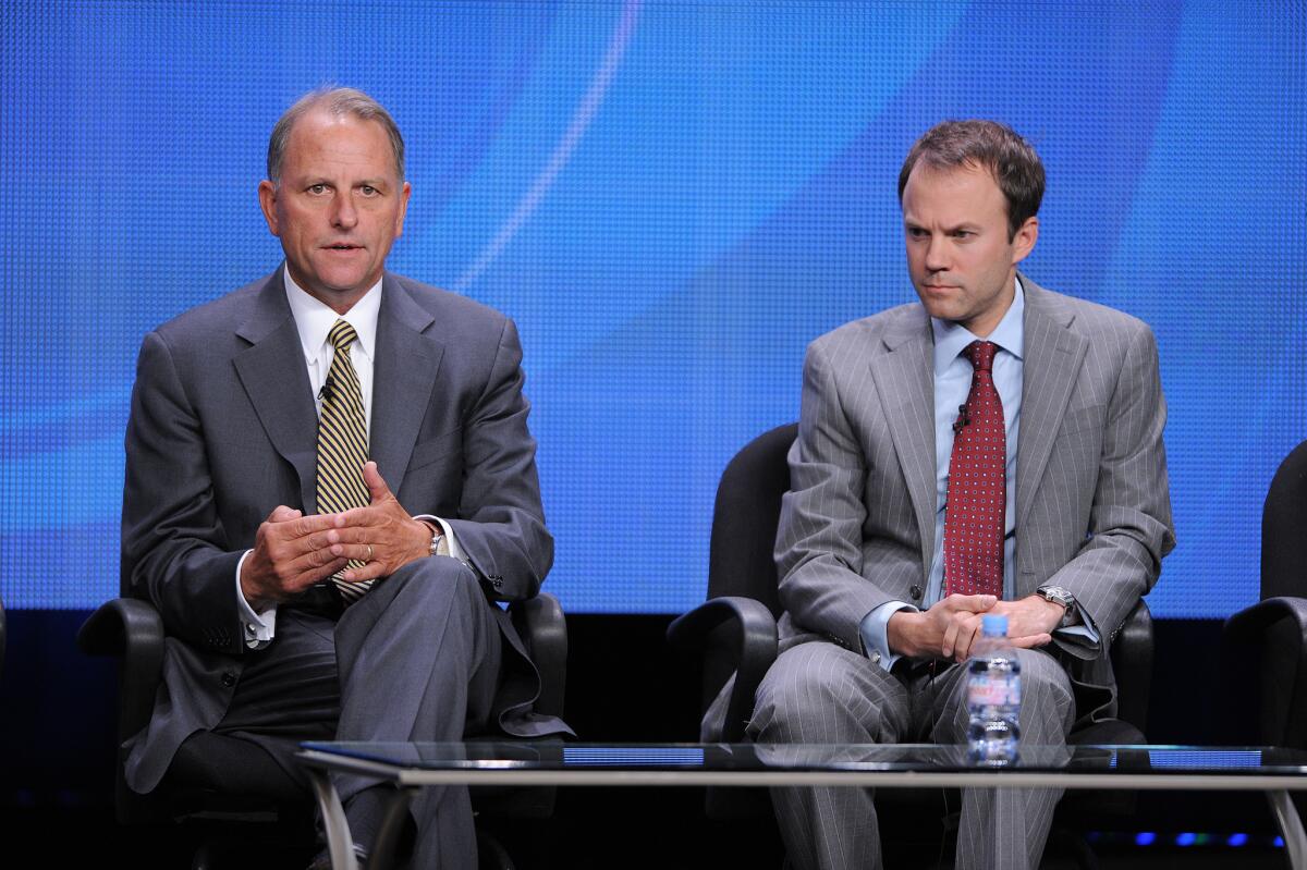 Jeff Fager, left, and David Rhodes take part in a Television Critics Assn. panel discussion in Beverly Hills on July 29, 2012.