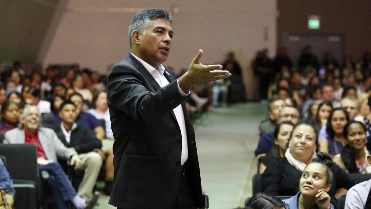 Rep. Tony Cárdenas (D-Los Angeles) asks a question during a town hall with students in Panorama City.