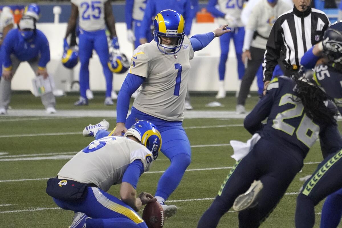 Rams kicker Matt Gay kicks a field goal against the Seattle Seahawks on Jan. 9.