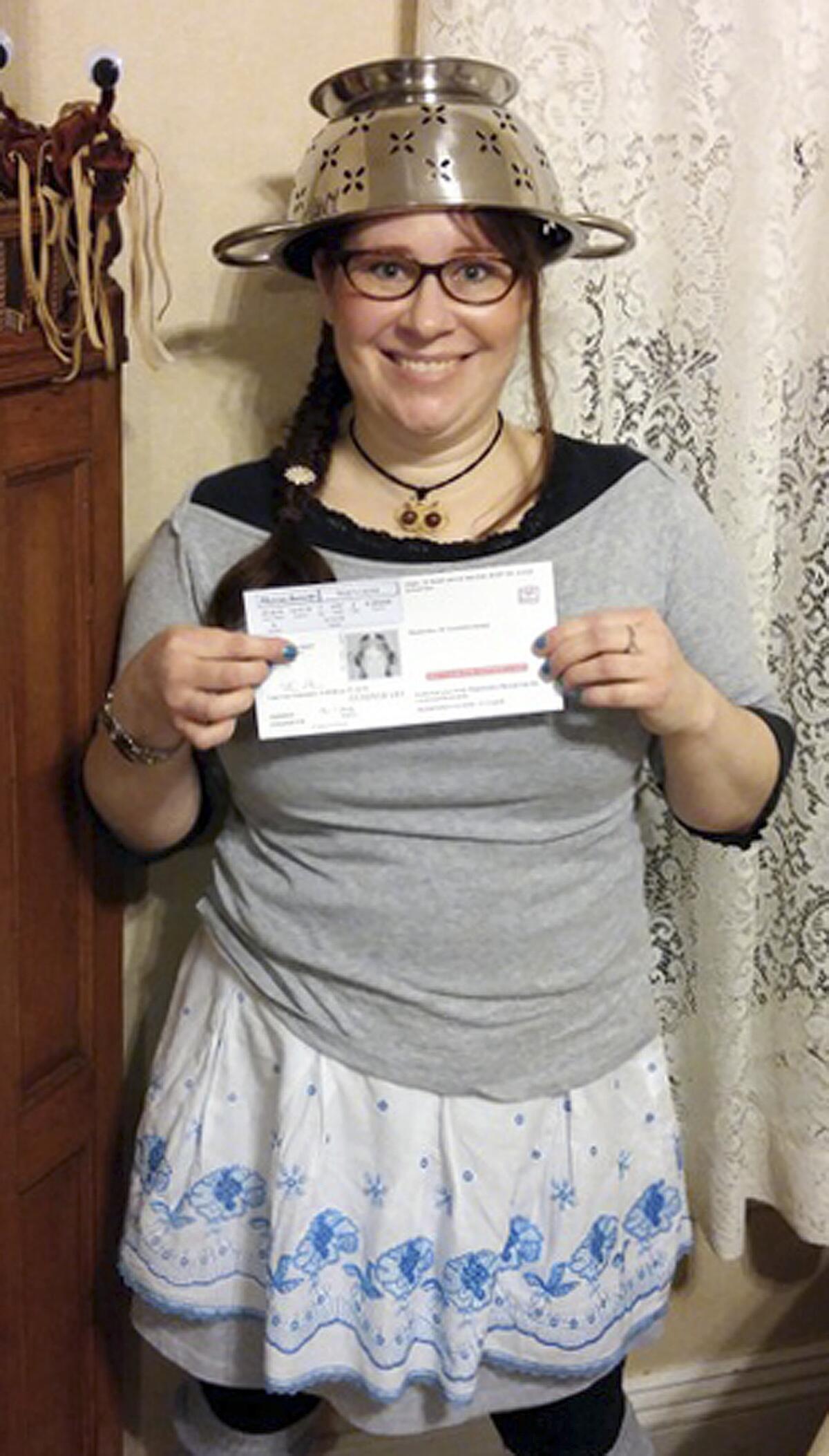 Lindsay Miller of Lowell, Mass. won the right to wear a colander on her head for her driver's license photo. Miller is a practicing Pastafarian, largely viewed as a satirical religion that worships the Flying Spaghetti Monster.