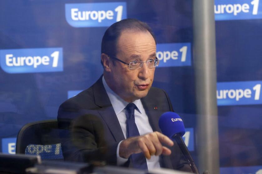 French President François Hollande, shown during an interview Dec. 21 with Europe 1 radio station studio, lost a key element of his economic plan Saturday when France's Constitutional Council threw out his "supertax" on the wealthy.