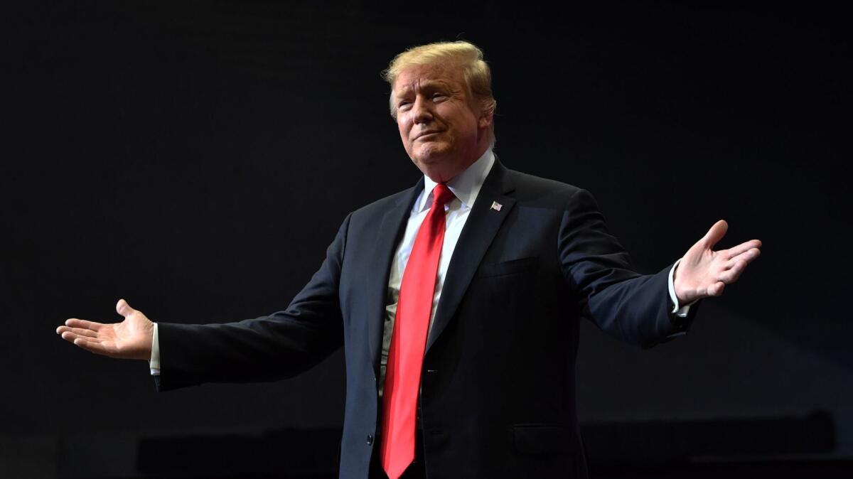 President Trump, shown at a campaign rally in Grand Rapids, Mich., on Thursday, has promised to deliver a "spectacular" healthcare plan to replace Obamacare.