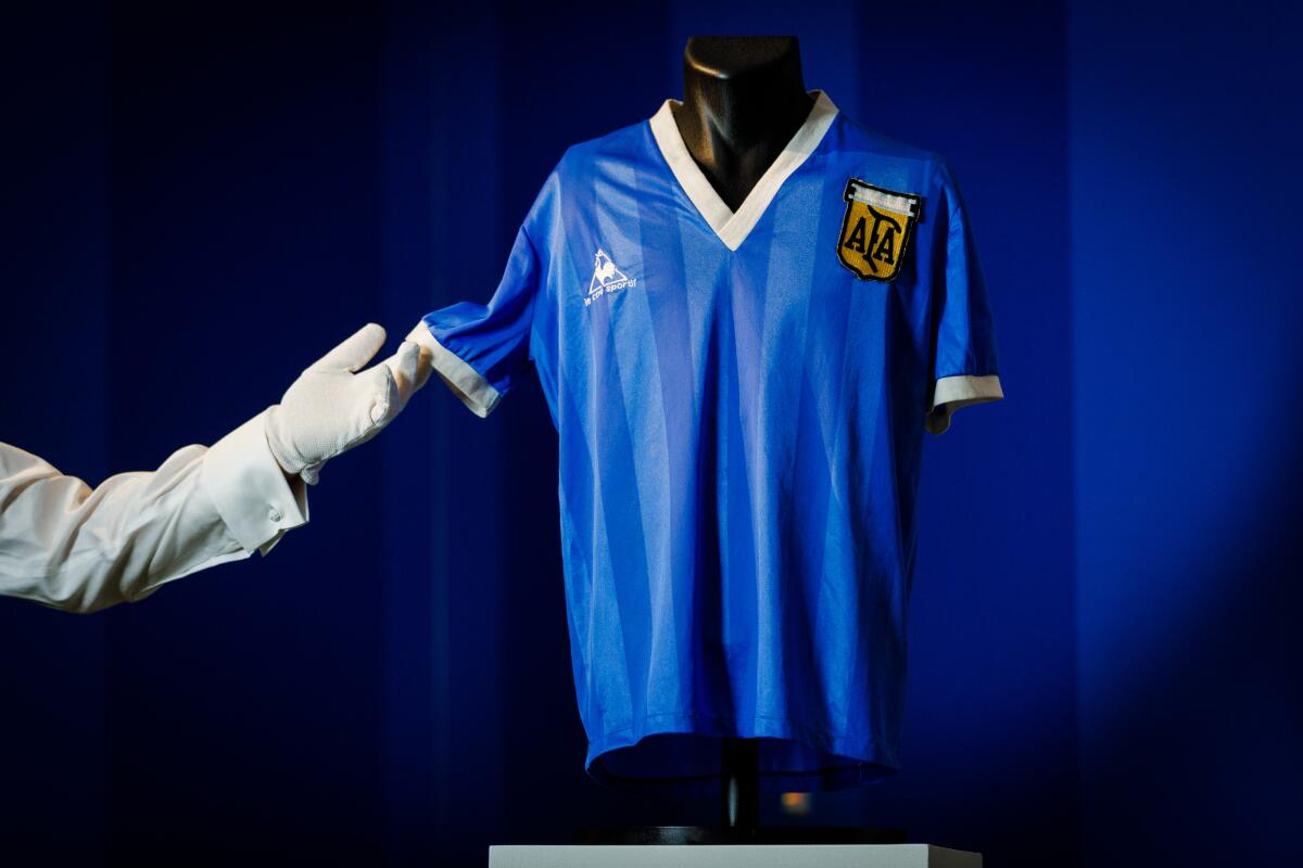Diego Maradona’s historic 1986 World Cup match-worn jersey was sold at auction for $9.28 million.