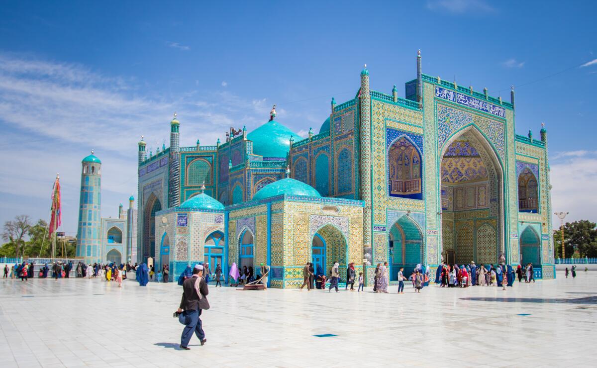 A man entering the blue mosque of Mazar-e-Sharif in Afghanistan