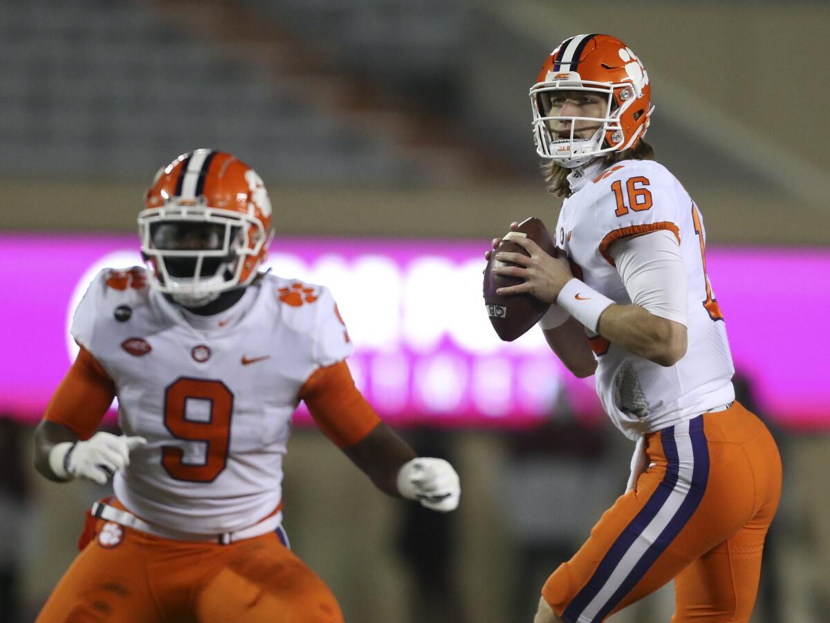 Clemson quarterback Trevor Lawrence looks to throw against Virginia Tech in the first quarter Saturday.