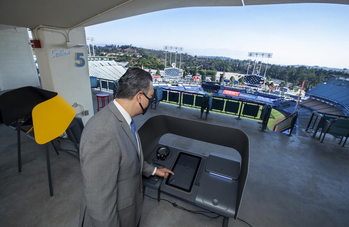 California Secretary of State Alex Padilla visits the Dodger Stadium Vote Center on Sept. 24. 