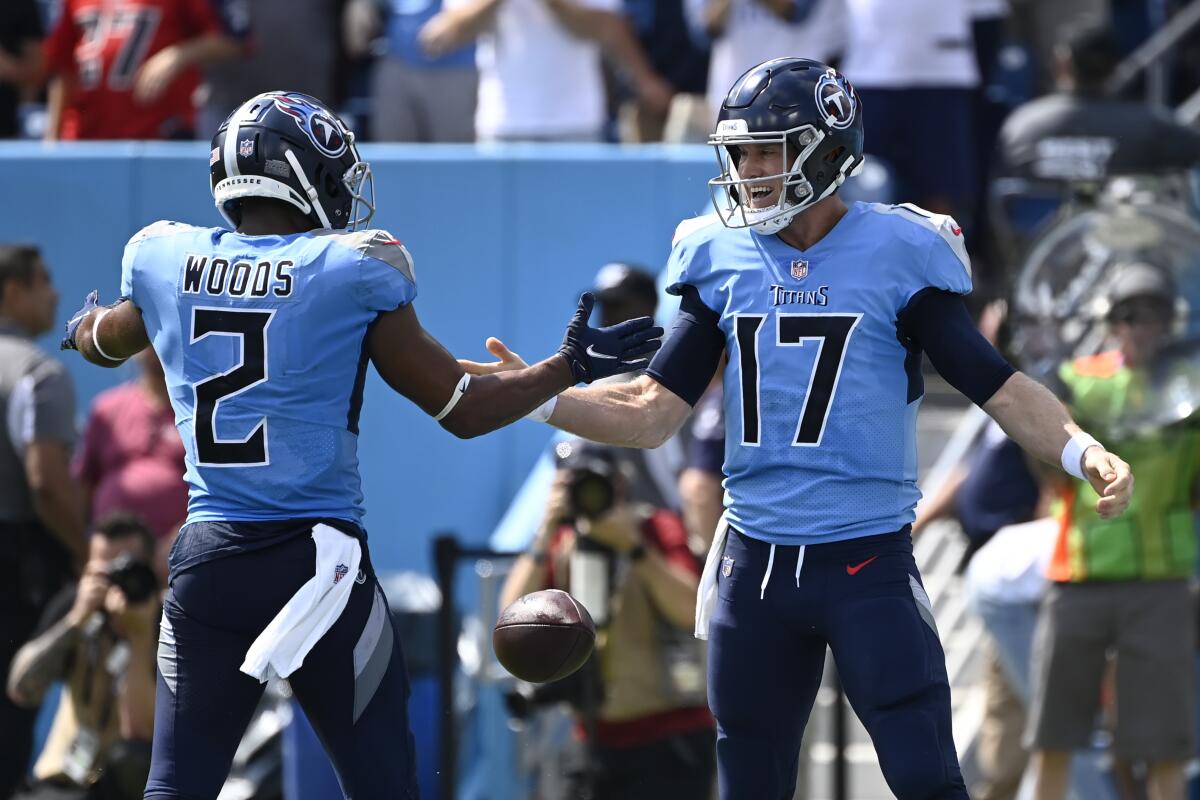 Tennessee Titans quarterback Ryan Tannehill (17) celebrates