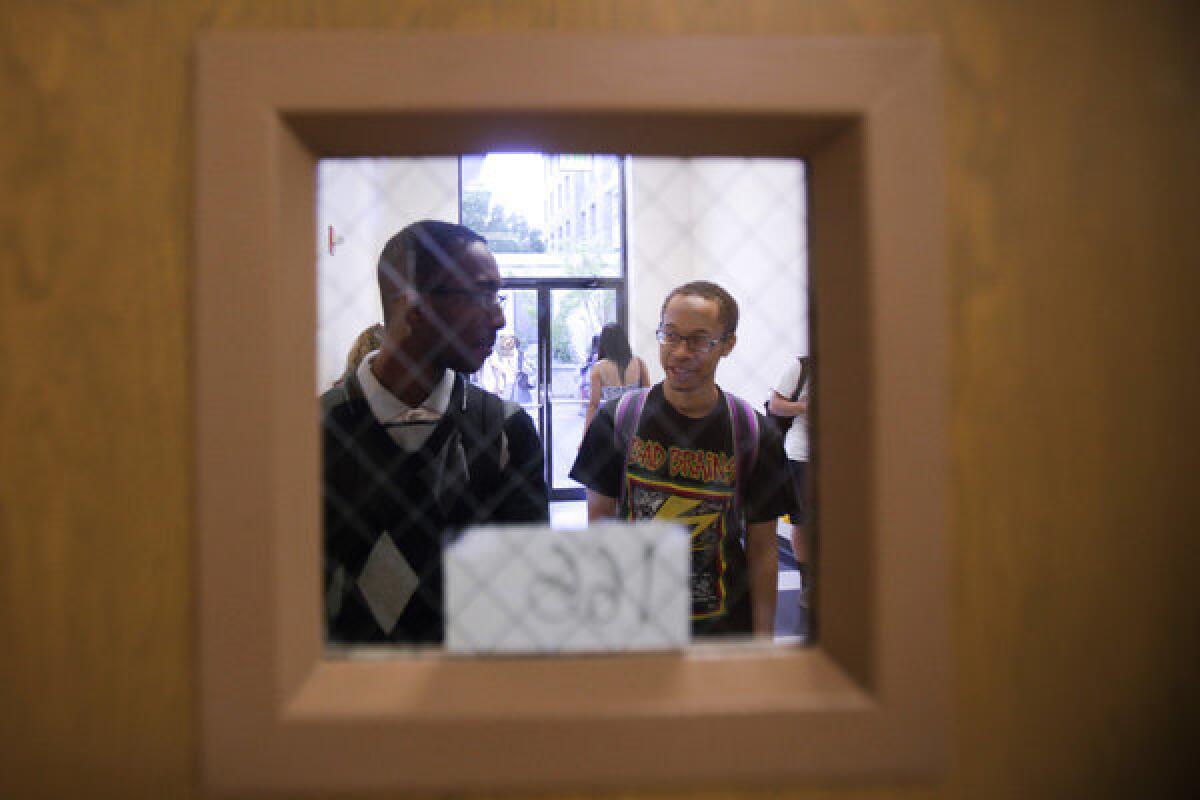 Kashawn Campbell and his best friend, classmate and roommate Spencer Simpson, walk into their African American studies class.