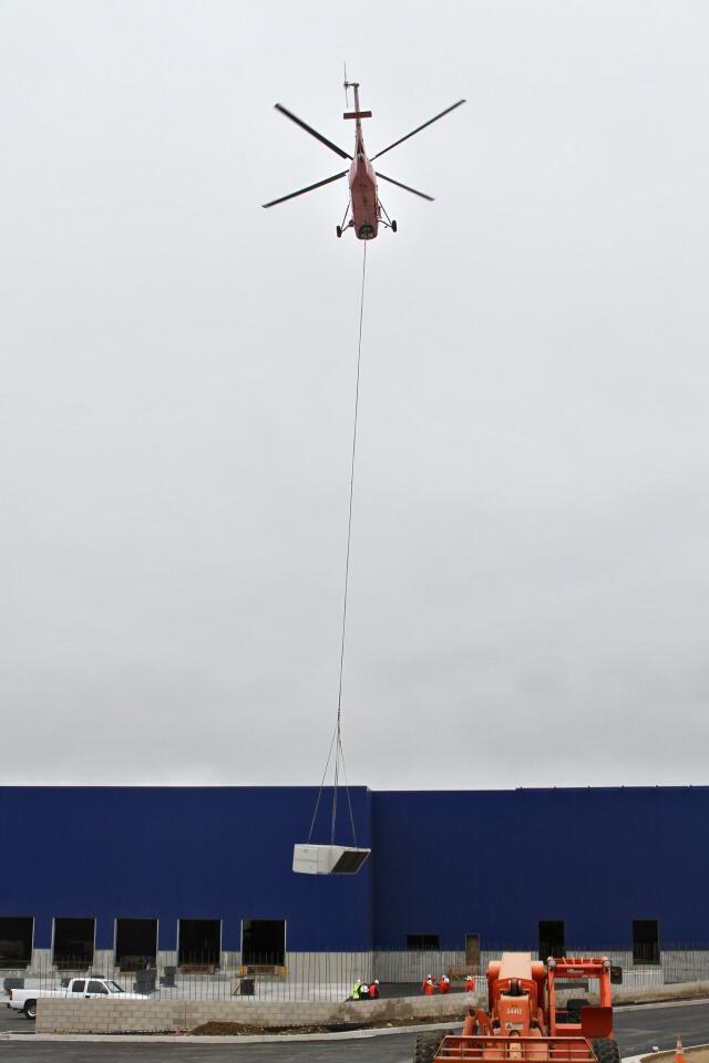 Photo Gallery: Air-conditioning units air-lifted to new Burbank Ikea store roof