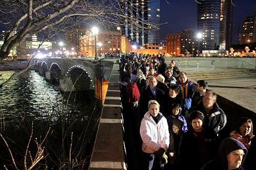 The public viewing begins alongside the Grand River outside the Gerald R. Ford Presidential Museum early Tuesday evening in Grand Rapids as Ford's body is returned to Michigan. A private ceremony was held earlier inside the museum.