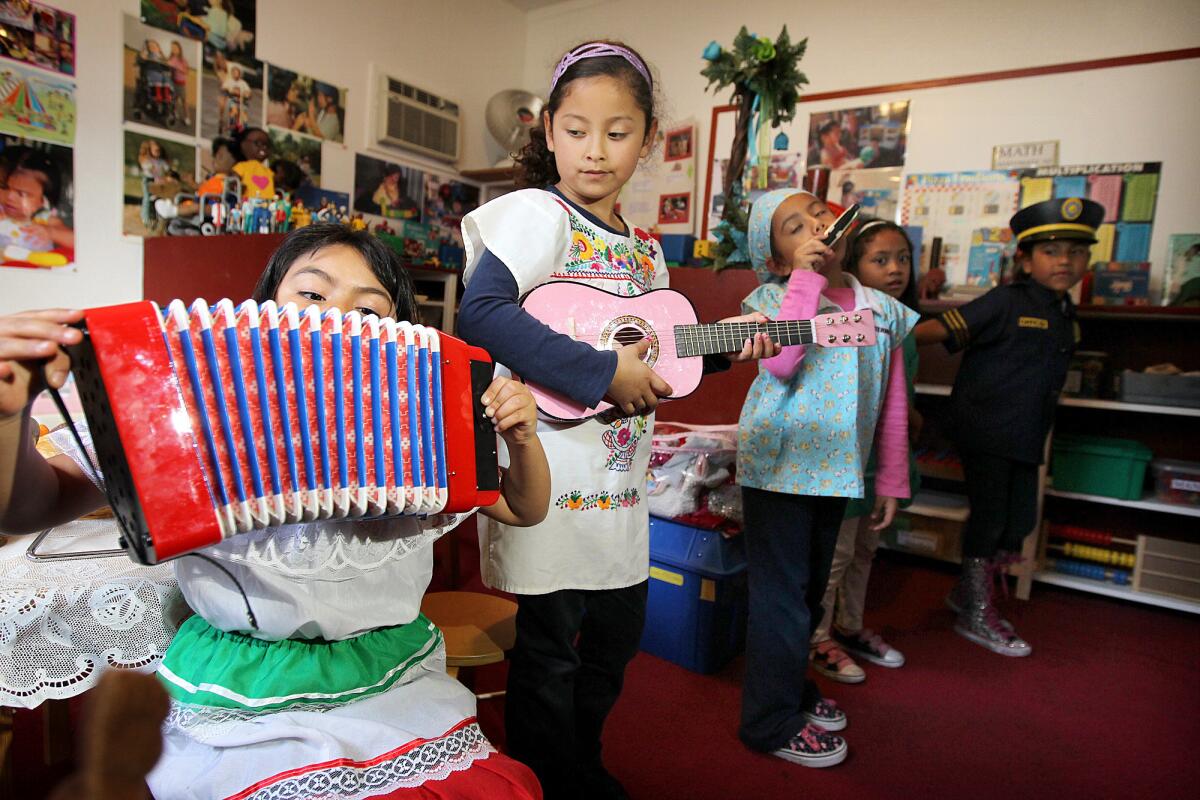 Children play at Ramona's Day Care in Long Beach. More than 113,000 young Latinos in California weren’t counted in the 2010 census, a new study says, with 47,000 of them in Los Angeles County.