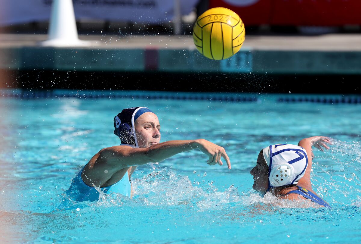 Aubrie Anderson, left, shoots against Agoura during the first half of the Division 1 championship match in February 2022.