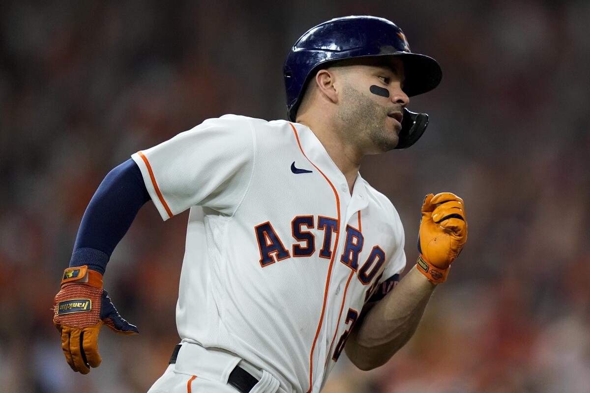 The Astros' Jose Altuve rounds the bases after homering against the Red Sox during Game 1 of the ALCS.