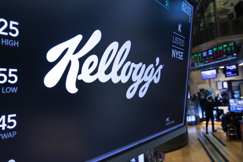 FILE - The logo for Kellogg's appears above a trading post on the floor of the New York Stock Exchange, Oct. 29, 2019. Breakfast food giant Kellogg Co. has lost a legal bid to block new anti-obesity measures in England banning the promotion of sugary cereals. A High Court judge on Monday July 4, 2022, rejected the company’s argument that the regulations don’t take into account the nutritional value of milk added to cereal. (AP Photo/Richard Drew, File)
