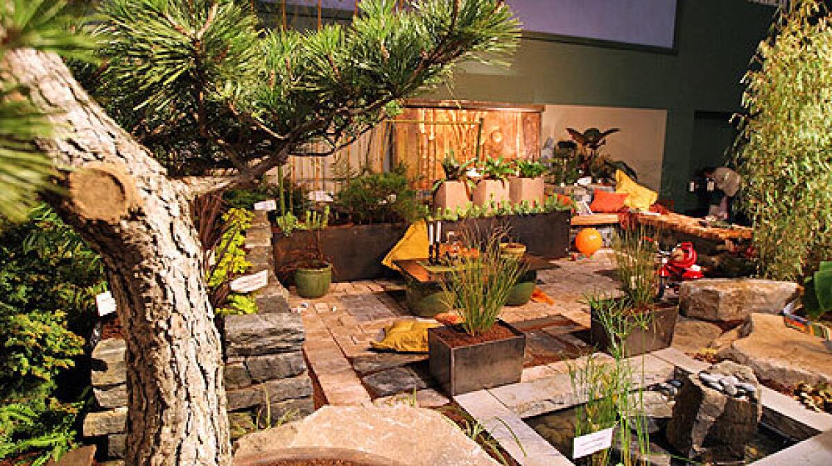 Garden designers at the Northwest Flower & Garden Show in Seattle mounted elaborate displays using containers and planters to artfully landscape small urban spaces. There were many ideas that would work well in L.A., where more Angelenos are living in condominiums and apartment. Eden Landscape Designs display garden showed how stonework and containers can create visual interest in limited space.