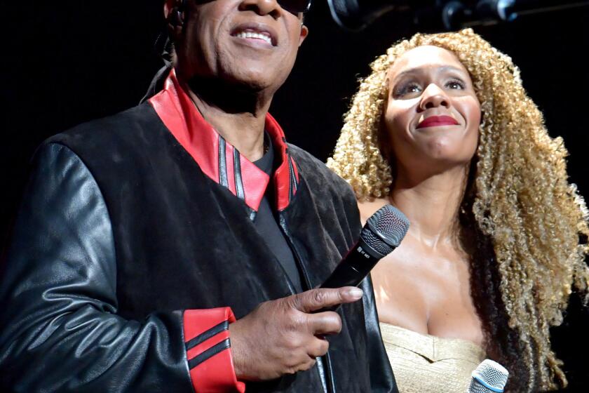 LOS ANGELES, CALIFORNIA - DECEMBER 09: Stevie Wonder and Aisha Morris perform onstage during the 22nd Annual House Full Of Toys Benefit Concert Featuring The STEVIE WONDER SONG PARTY: A Celebration Of Life, Love & Music at Staples Center on December 09, 2018 in Los Angeles, California. (Photo by Lester Cohen/Getty Images for Wonder Productions, Inc.) ** OUTS - ELSENT, FPG, CM - OUTS * NM, PH, VA if sourced by CT, LA or MoD **