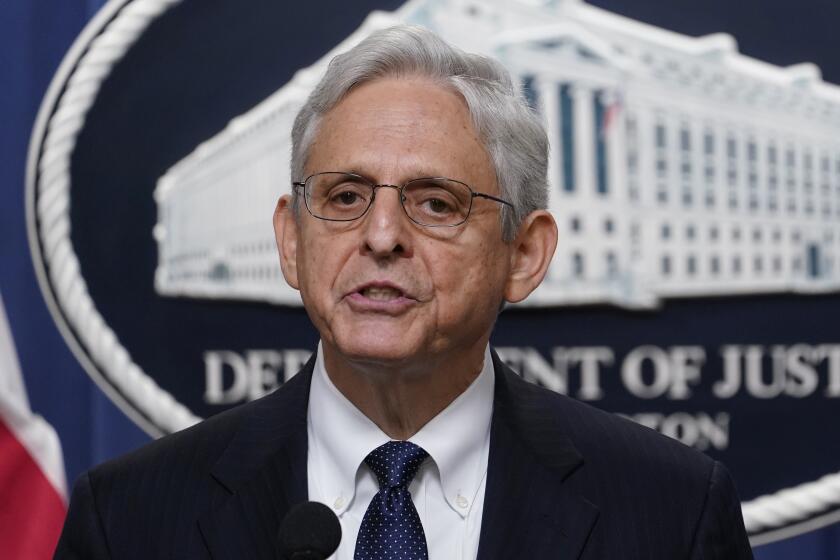 Attorney General Merrick Garland speaks at the Justice Department Thursday, Aug. 11, 2022, in Washington. (AP Photo/Susan Walsh)