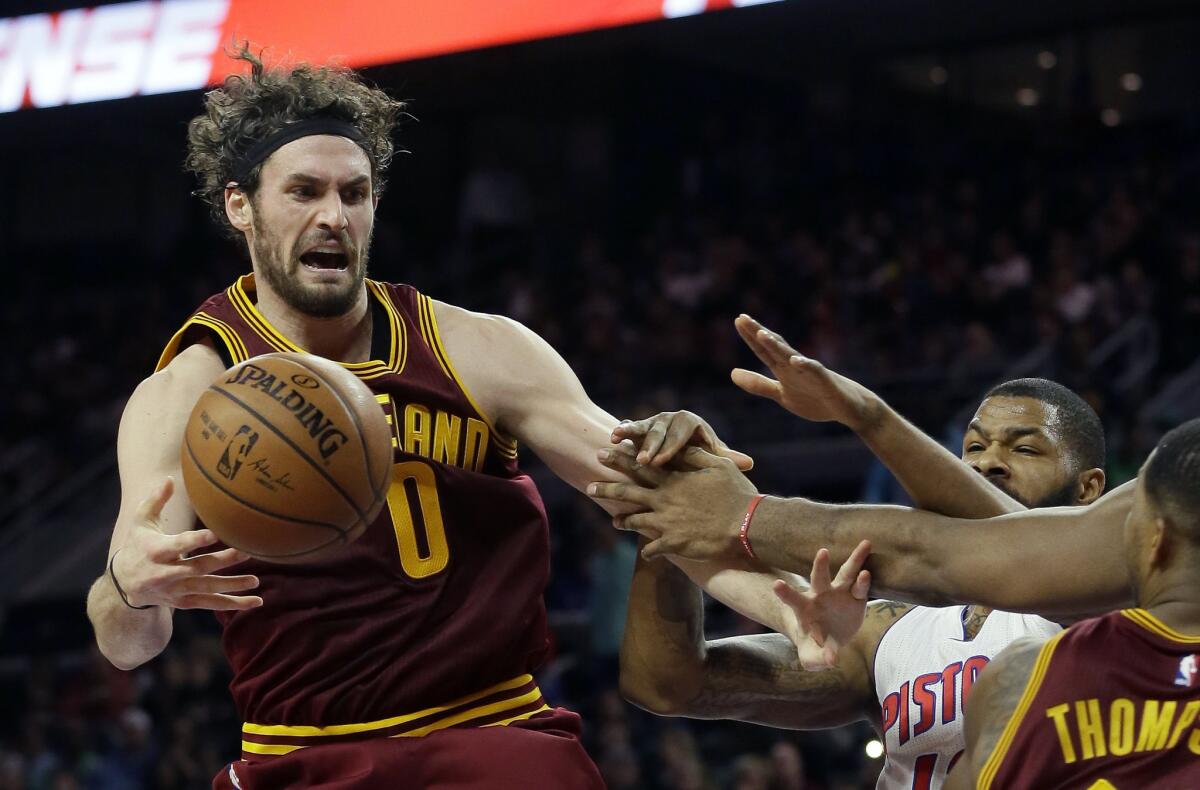 Cleveland Cavaliers forward Kevin Love is fouled by Detroit Pistons forward Marcus Morris during the second half of a game on Jan. 29.