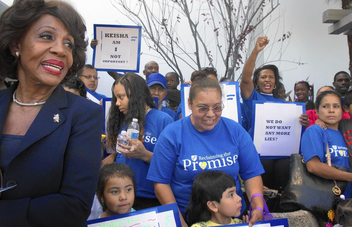 Rep. Maxine Waters (D-Los Angeles) joins Kedren Head-Start staff members, parents and students at a protest at the Los Angeles County Office of Education's Downey headquarters.