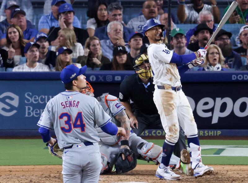 Mookie Betts hits a RBI double off Mets pitcher Kodai Senga in the eighth inning vs. Mets at Dodger Stadium.