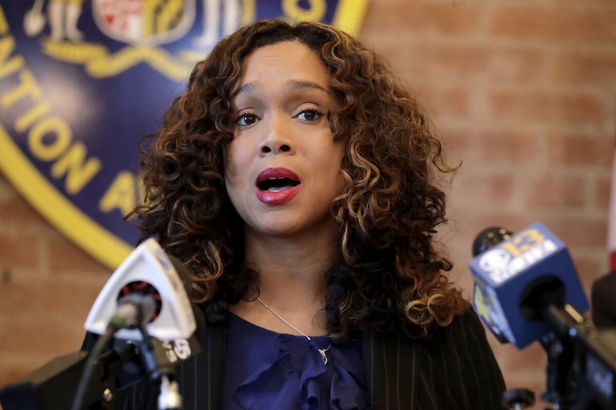 FILE -Maryland State Attorney Marilyn Mosby speaks during a news conference announcing the indictment of correctional officers, Tuesday, Dec. 3, 2019, in Baltimore. Mosby, Baltimore's top prosecutor asked a federal judge on Friday, April 1, 2022 to postpone her trial on charges that she made false statements on financial documents to withdraw money from her retirement savings and purchase two Florida vacation homes. (AP Photo/Julio Cortez, File)
