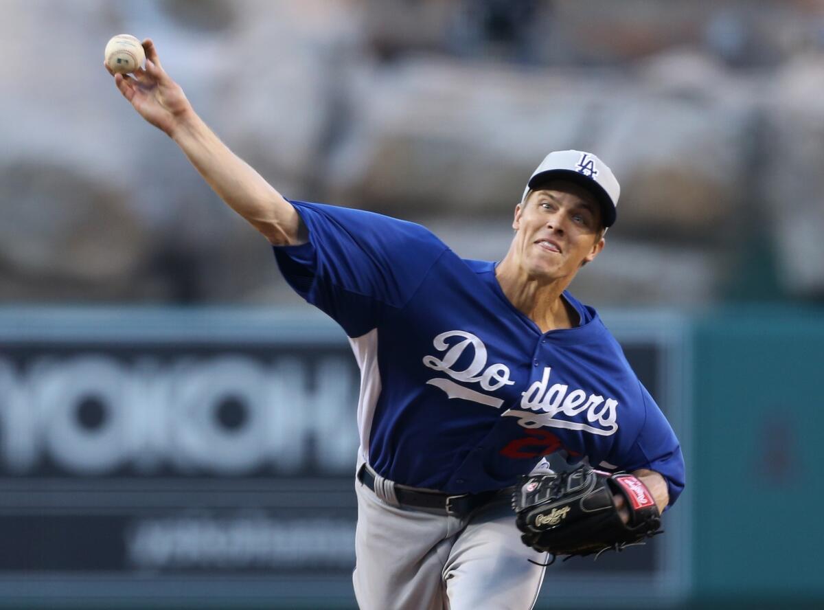 Dodgers starter Zack Greinke delivers a pitch during an exhibition game against the Angels.