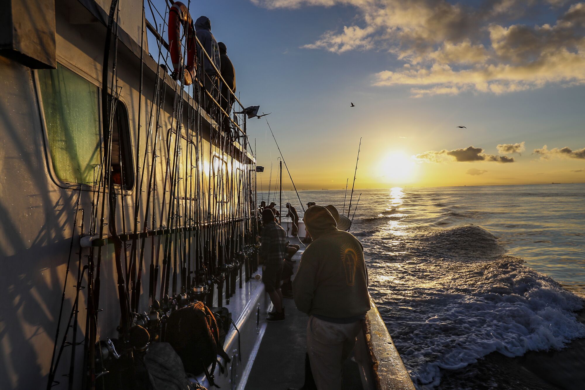 The Enterprise ferries fishermen to warming waters near Catalina Island in search of rare schools of Dorado.