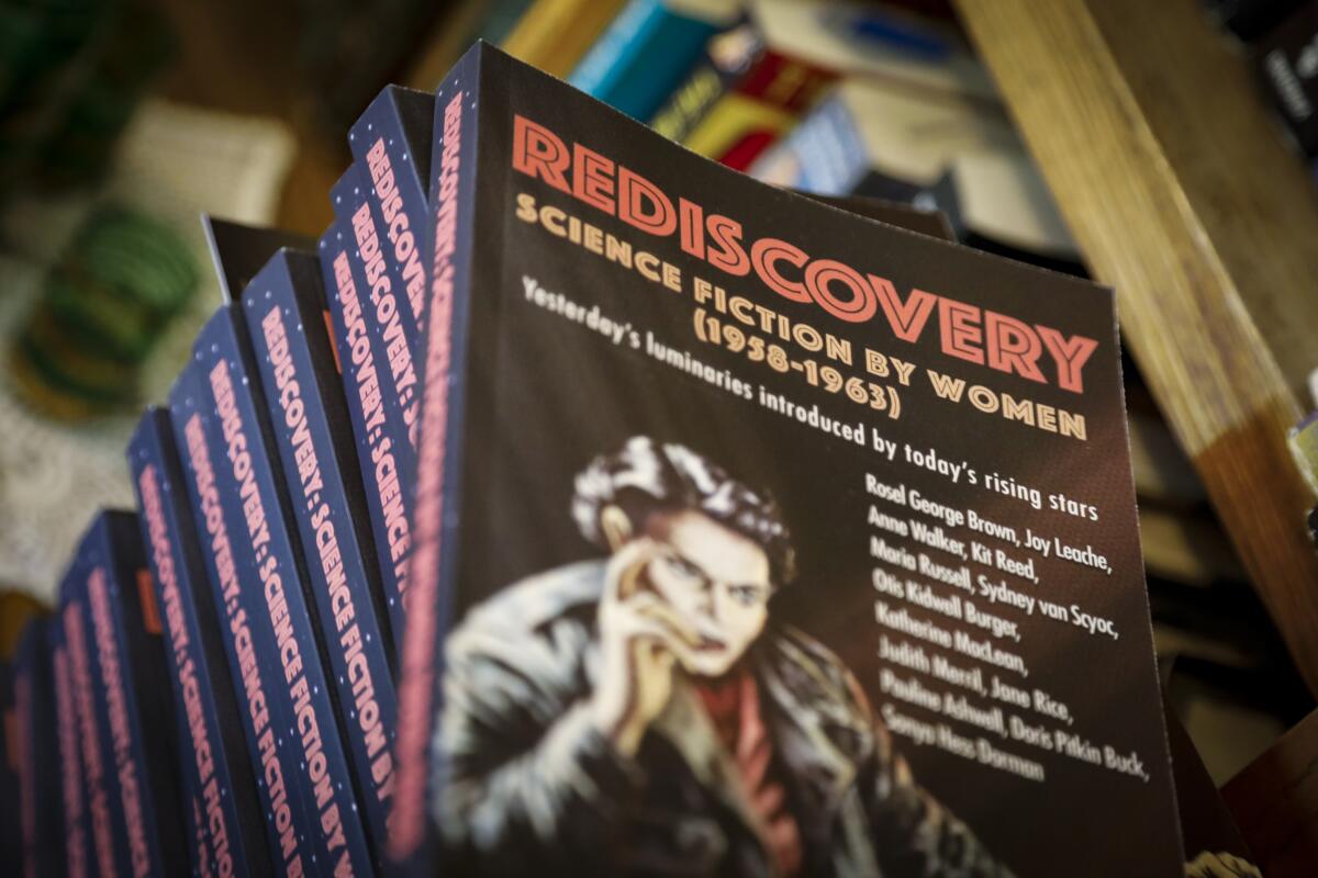 Copies of "Rediscovery," a selection of science fiction stories written by women authors in the late 1950s and early 1960s, at the Vista home of Gideon Marcus, founder and lead author of the science and fiction blog Galactic journey, which is written as if it takes place 55 years in the past.