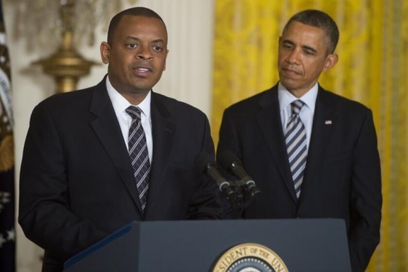 Charlotte, N.C., Mayor Anthony Foxx speaks alongside President Obama in the East Room of the White House after Obama announced Foxx as his nominee to be the next secretary of Transportation.