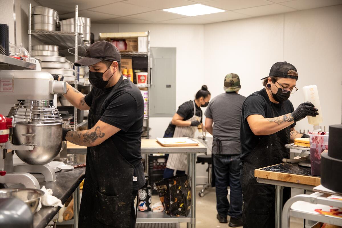 Chula Vista bakery workers work on desserts.