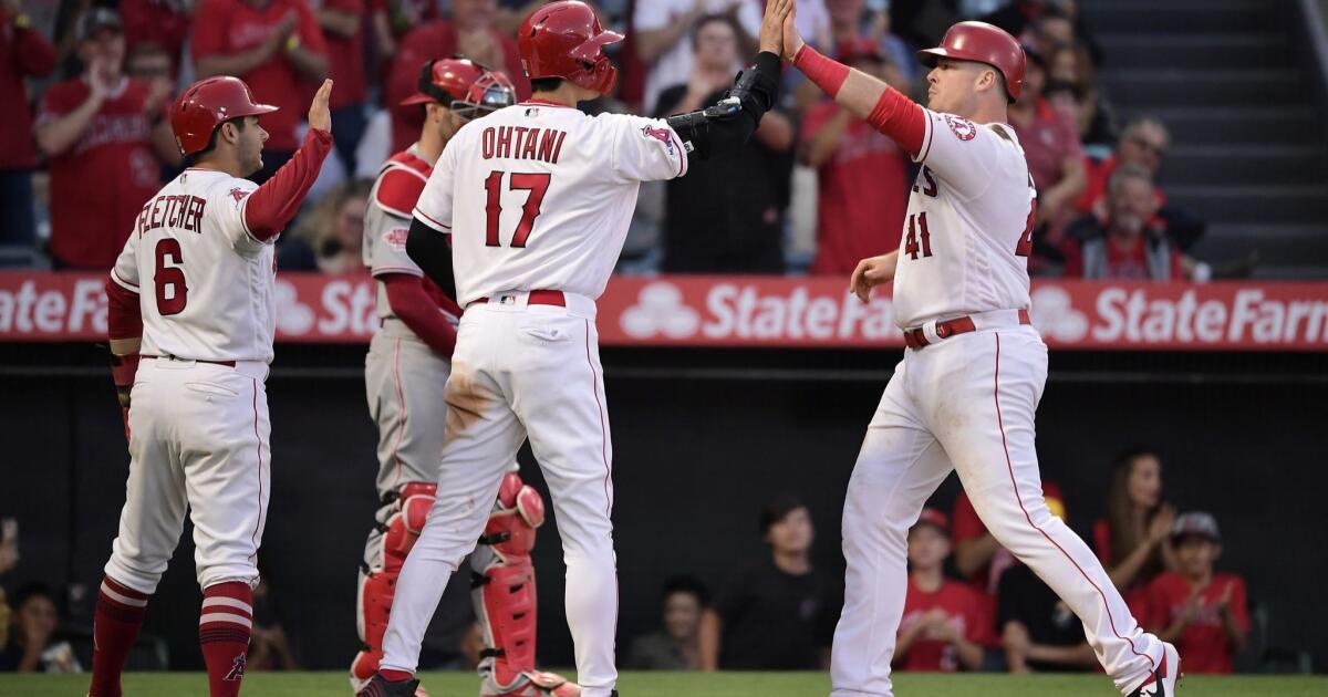 Justin Bour's 2 home runs help Angels climb above .500 at midpoint