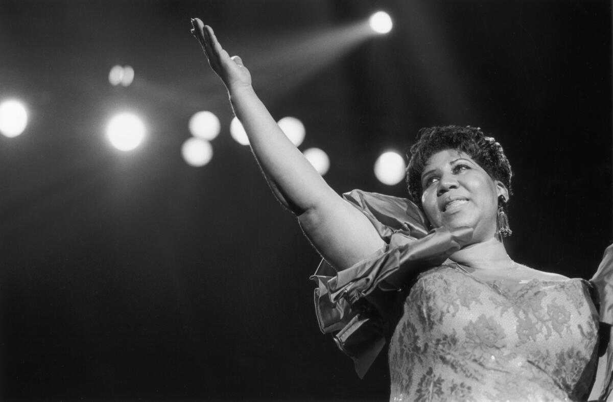 Aretha Franklin performs at the New Orleans Jazz Festival in 1994.