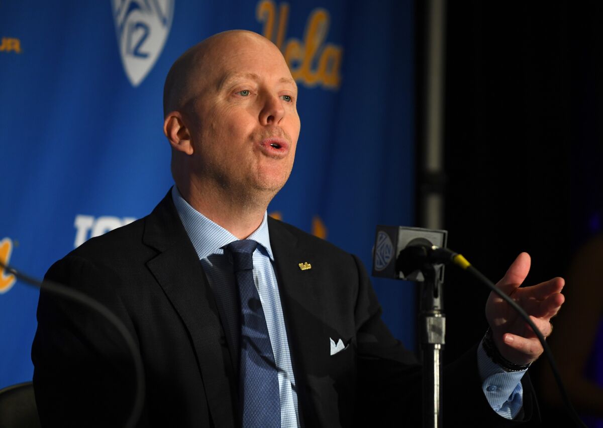UCLA coach Mick Cronin speaks at a news conference.
