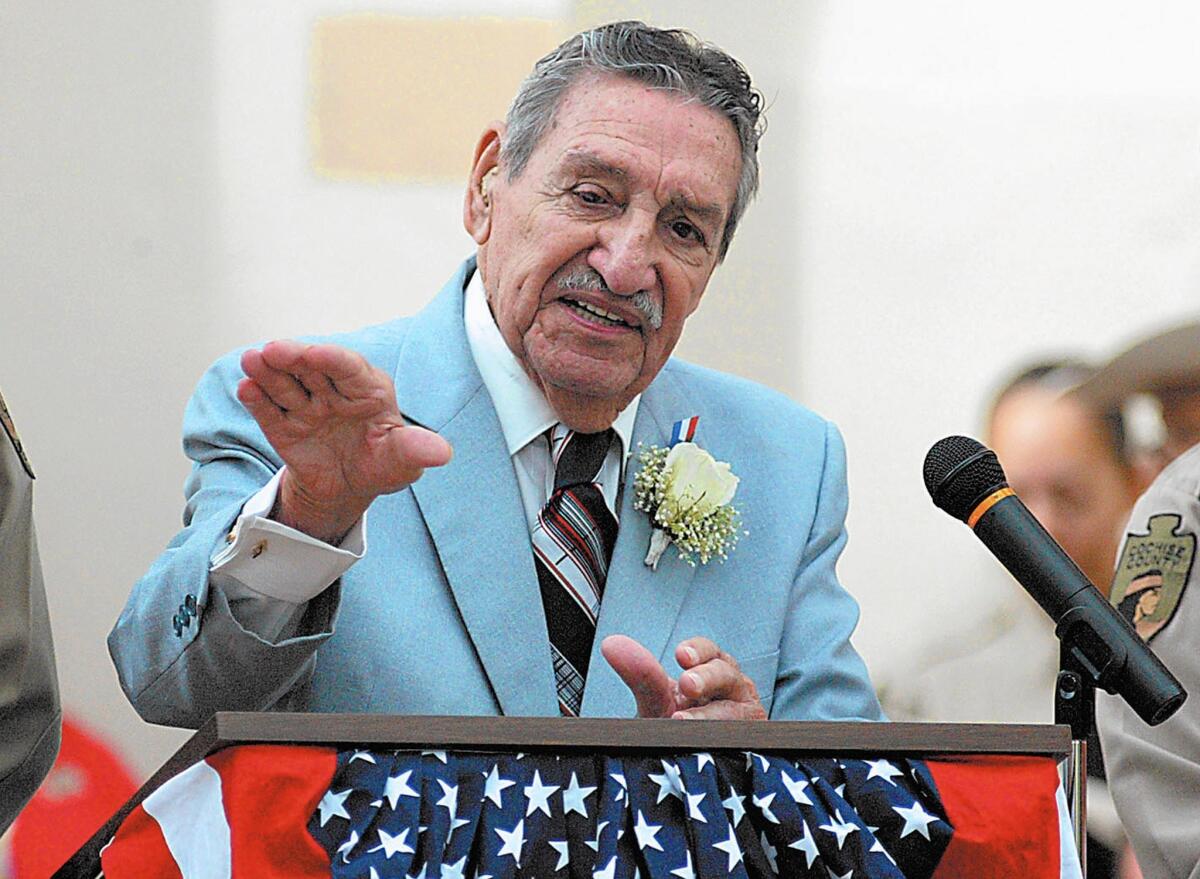 Raul Hector Castro, former governor of Arizona and former U.S. ambassador to El Salvador, Bolivia and Argentina, speaks at a 2006 news conference in Bisbee, Ariz.