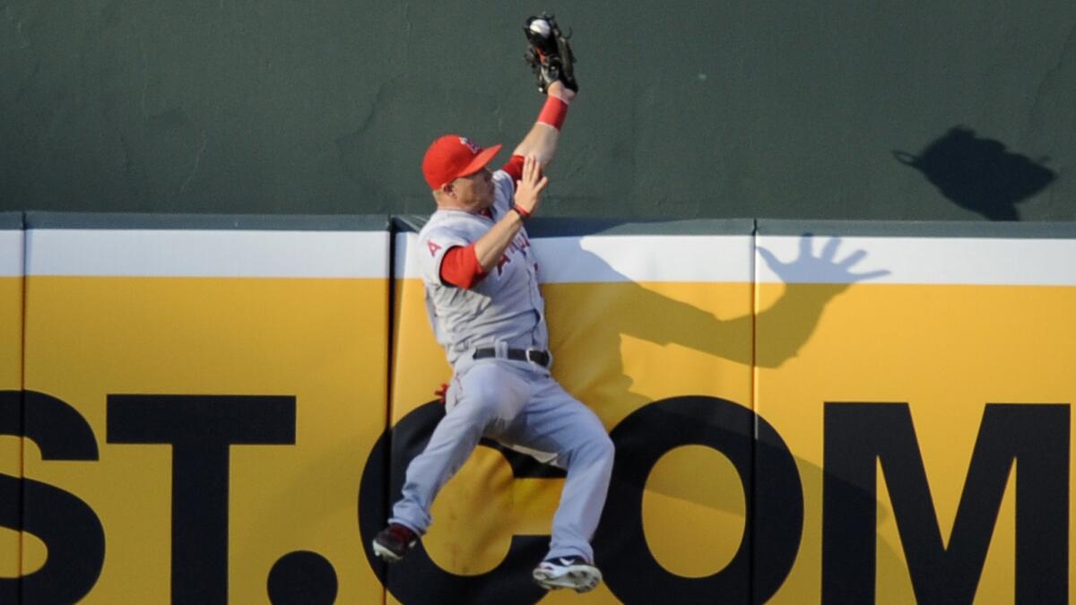 Angels center fielder Mike Trout makes a leaping catch on a ball hit by Baltimore's J.J. Hardy during a game at Oriole Park at Camden Yards on June 27, 2012.