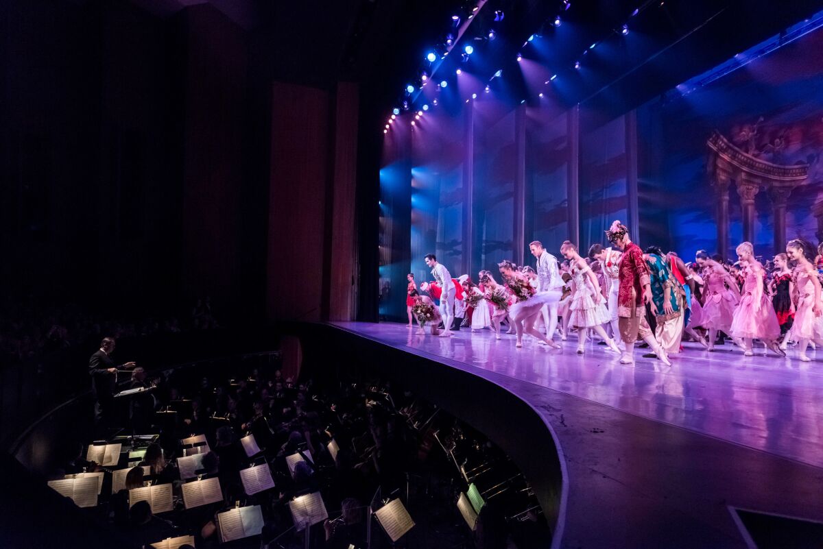 Ballet dancers take their bows on stage