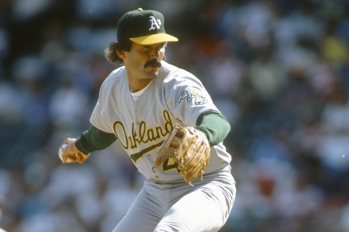 Oakland Athletics pitcher Dennis Eckersley delivers during a game in 1992. His place in Dodgers history is only sort of lost on Gavin Lux.