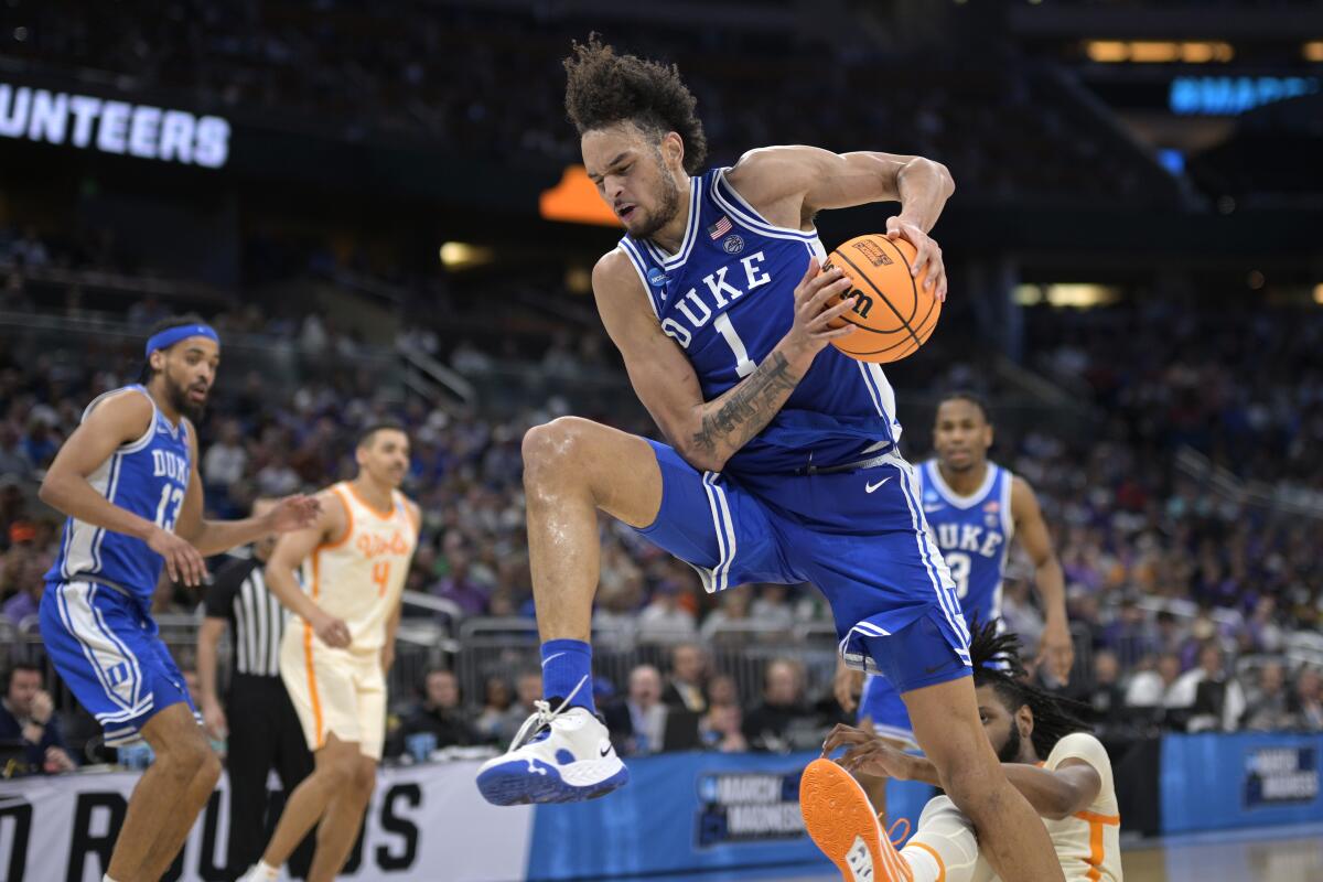 Duke center Dereck Lively II grabs a rebound during an NCAA tournament game against Tennessee in March.