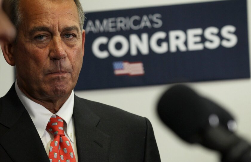 A study of facial expressions and language used by members of Congress suggests that it's premature to conclude that conservatives are more happy than liberals. Here, U.S. Speaker of the House Rep. John Boehner (R-OH) listens during briefing to members of the media in January.