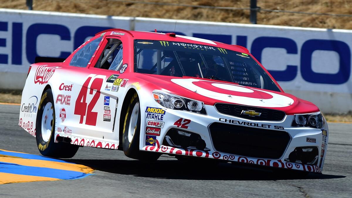 Driver Kyle Larson negotiates a curve at Sonoma Raceway during NASCAR Cup qualifying on Saturday.