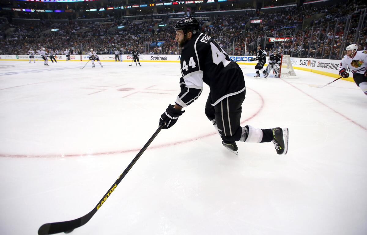 Kings' Robyn Regehr controls the puck during the first period of Game 4 of the Western Conference finals against the Chicago Blackhawks.