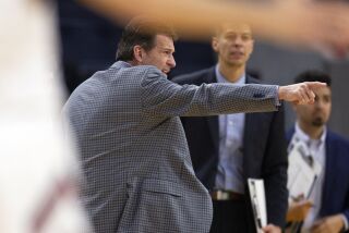 Nevada coach Steve Alford reacts to an official's call during a game against Saint Mary's on Dec. 21.