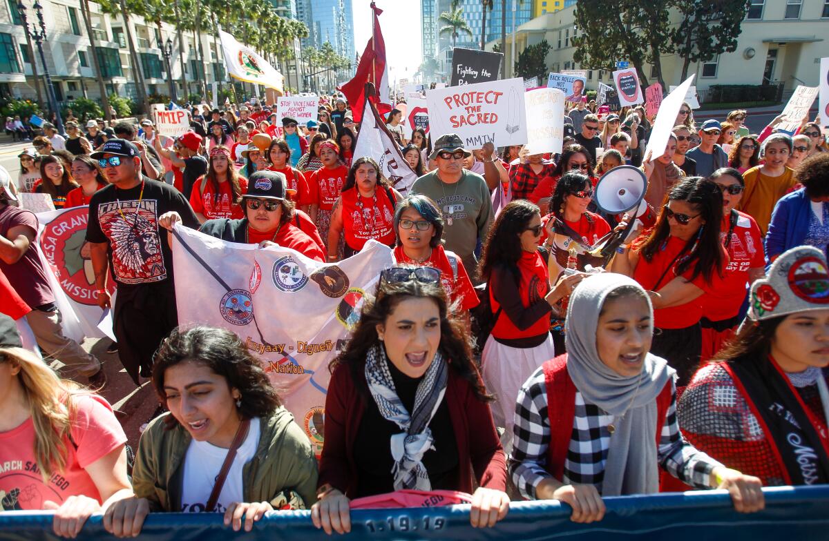 Thousands of marchers move north on Pacific Highway during the Women's March San Diego in San Diego on Saturday.