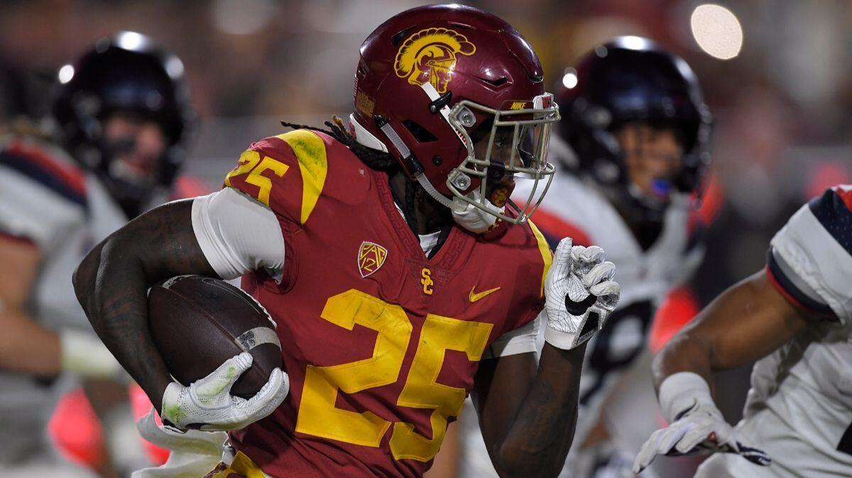 USC running back Ronald Jones II runs the ball during the first half against Arizona on Saturday at the Coliseum.