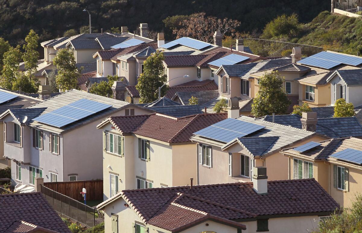 Rooftop solar installations on homes in the San Elijo Hills area of San Marcos.