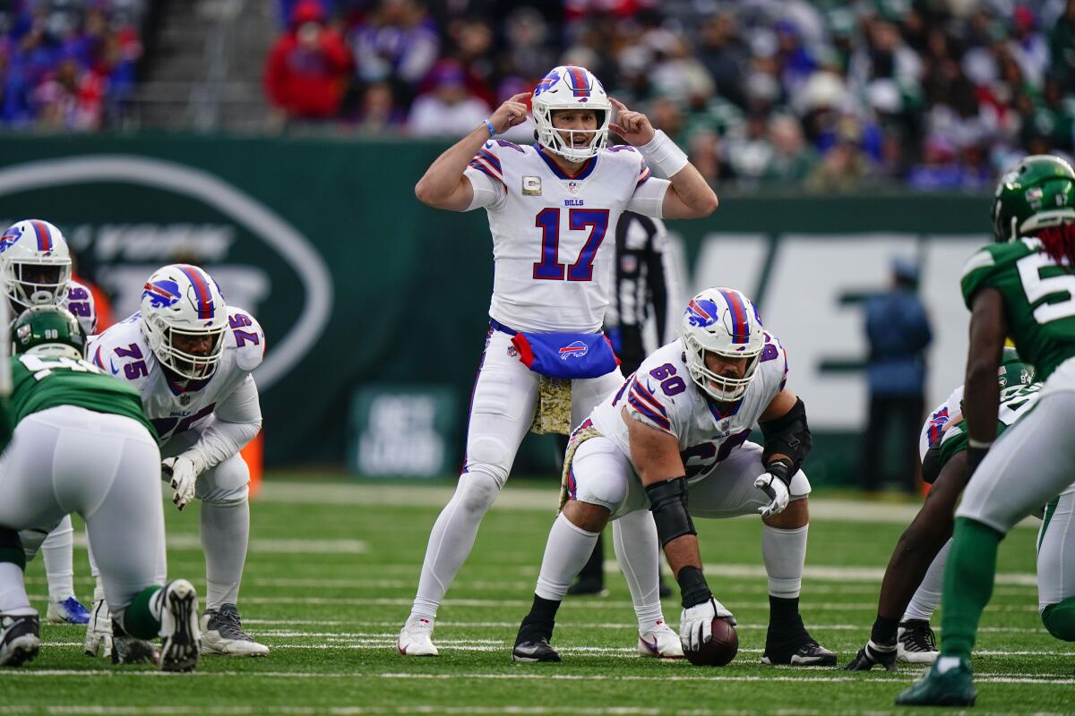Buffalo Bills quarterback Josh Allen signals at the line against the New York Jets.