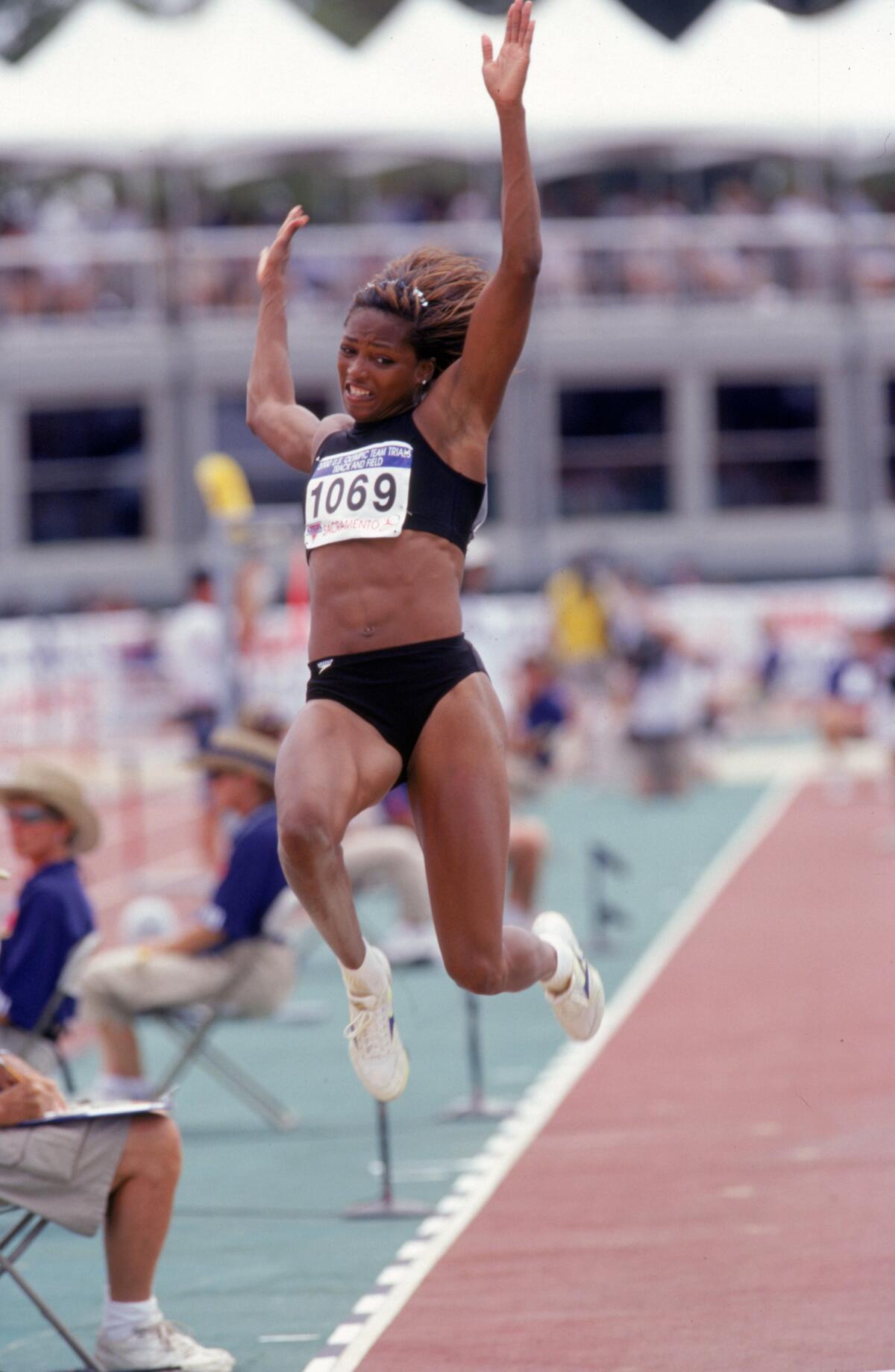 "Top Chef" contestant Dawn Burrell competing in the Long Jump Event of the 2000 U.S. Olympic Track & Field Team Trials