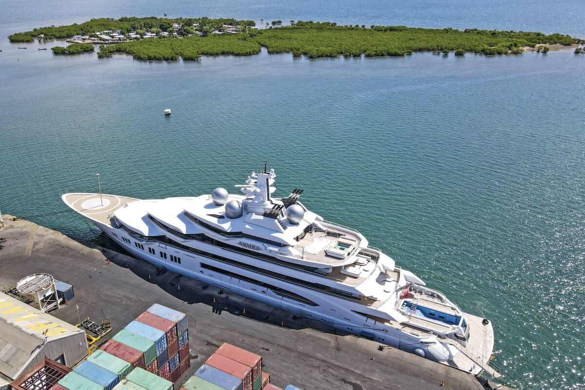 FILE - The superyacht Amadea is docked at the Queens Wharf in Lautoka, Fiji, on April 15 2022. A judge in Fiji has ruled that U.S. authorities can seize the Russian-owned superyacht — but has put a hold on his order until at least Friday, May 6, while defense lawyers mount a challenge. (Leon Lord/Fiji Sun via AP, File)